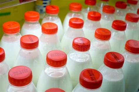 Milk In Plastic Bottles On The Market Stock Photo Image Of Group