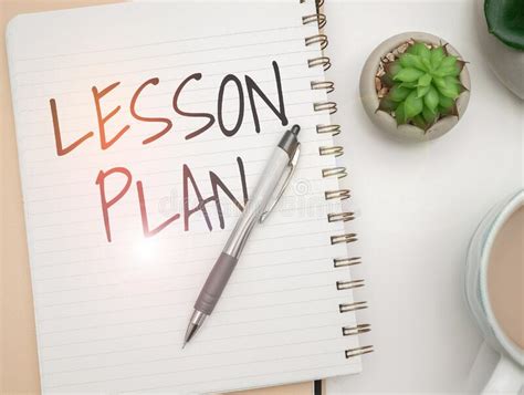 Sign Displaying Lesson Plan Word Written On A Teacher S Detailed