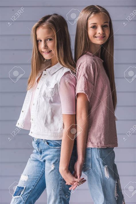 Teenage Girls Holding Hands