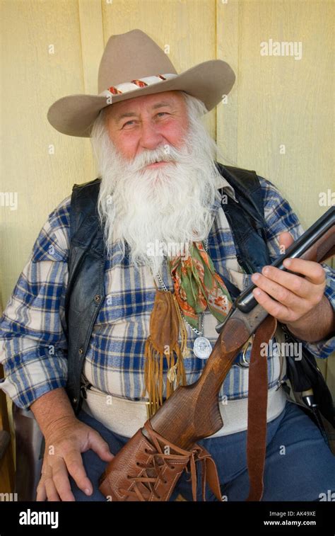 Arizona Town Of Williams Bearded Cowboy With Full Beard And Winchester