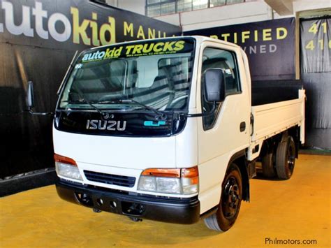 Used Isuzu Isuzu Elf DROPSIDE Truck 123 4HF1 10ft NKR 6w Japan Surplus