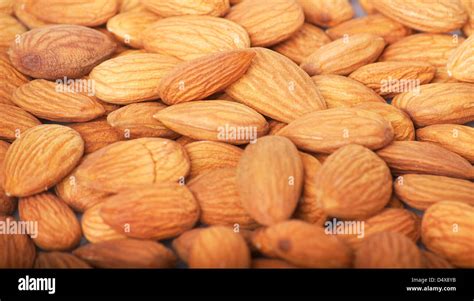 Pile Of Almonds Close Up As Background Stock Photo Alamy