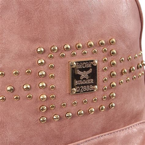 Mochila Feminina Estampa Em Alto Relevo Spikes E Tachas Compre