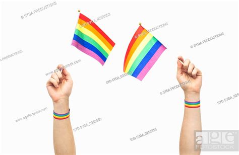 Hand With Gay Pride Rainbow Flags And Wristbands Stock Photo Picture