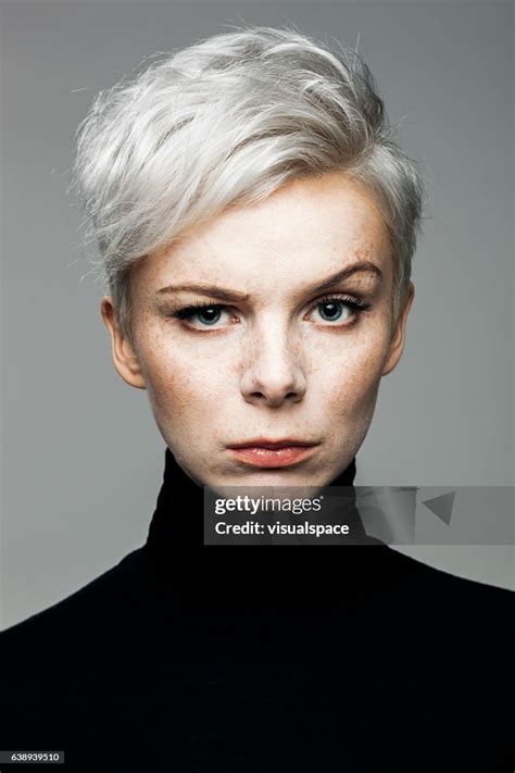 Woman With Raised Eyebrow High Res Stock Photo Getty Images