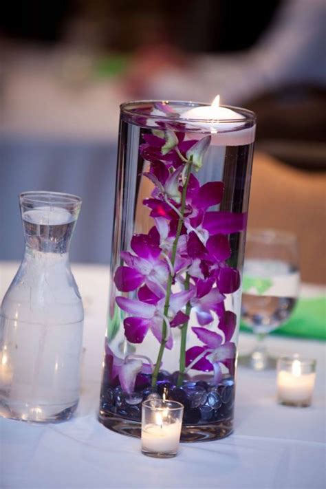 Diy Submerged Orchid Centerpiece With Floating Candle Purple Wedding