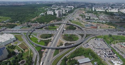 Aerial Moscow cityscape with busy roads and interchange, Russia