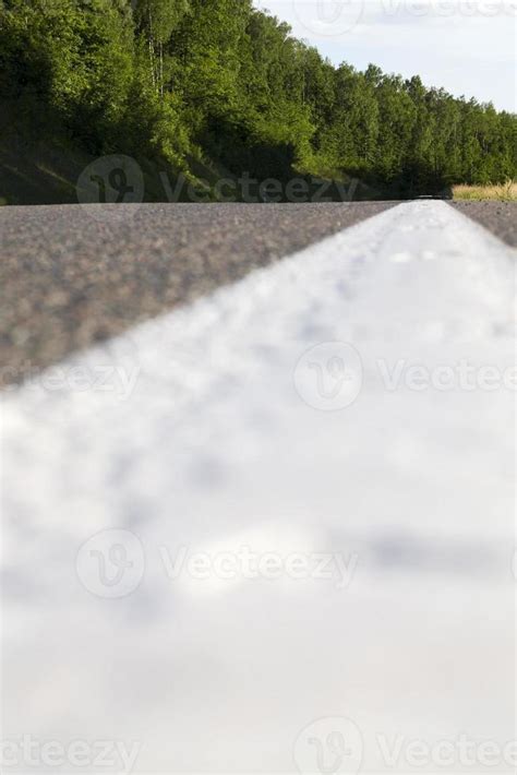 white line road markings 9419564 Stock Photo at Vecteezy