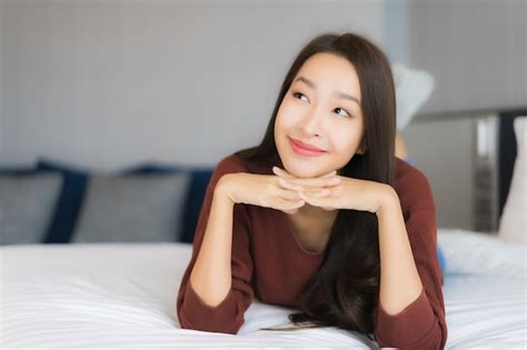 Free Photo Portrait Beautiful Young Asian Woman Relax On Bed In