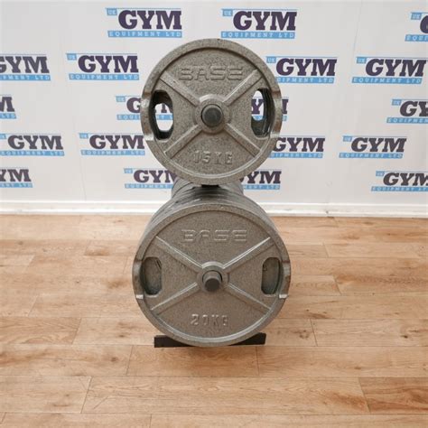 200kg Of Used Cast Iron Olympic Plate Weights And Tree Free Weights