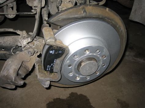 Diy How To Rear Mk5 Brake Pad And Rotor Replacement Brake Pads And Rotors