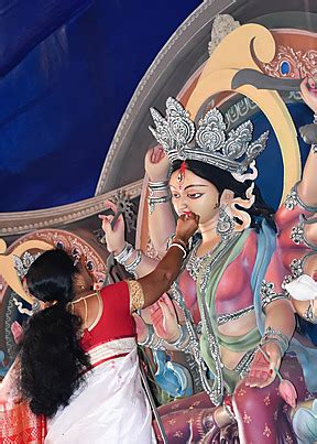 Goddess Devi Maa Durga At Kolkatas Durga Puja Festival Photo Background