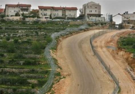 Palestinians demand removal of West Bank barrier, compensation ...