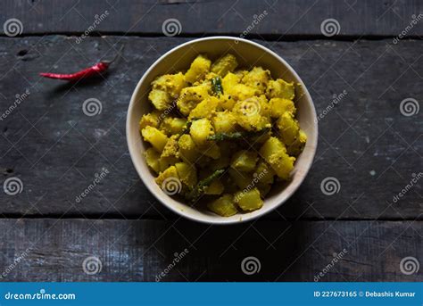 Bengali Cuisine Aloo Posto Or Potato Fried With Poppy Seeds With A Mixture Of Spices Close Up