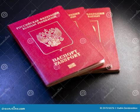 Three Russian Biometric Passports On A Dark Background Selective Focus