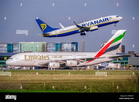 Manchester airport Emirates A380 388 Ryanair Boeing 737 takeoff Stock ...