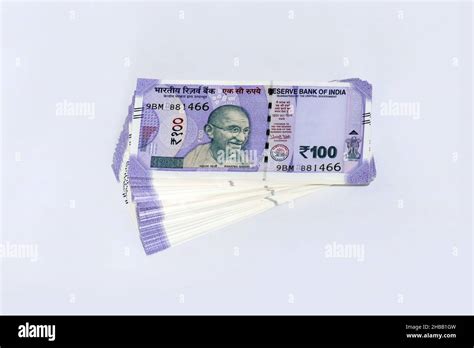 Stack Of One Hundred Indian Rupee Notes In White Background Indian