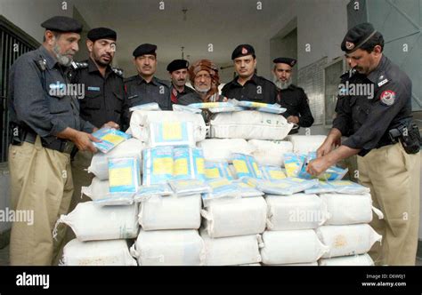 Capital City Police Official Showing Seized 120 Kilograms Charas