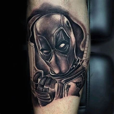 Typical black and gray style tattoo of Deadpool with pistols ...