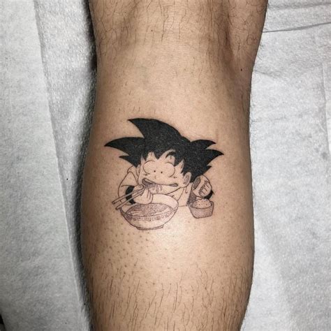 Goku Tattoo Located On The Calf Cartoon Style