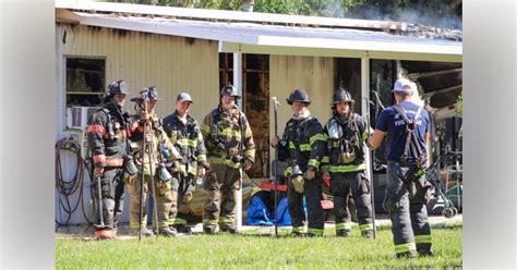 Marion County Firefighters Rescue Woman Dog From Burning Home Ocala