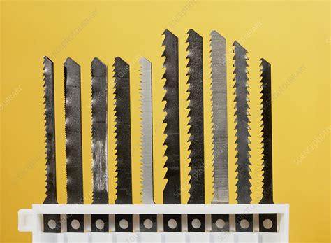 Jigsaw blades - Stock Image - H100/0833 - Science Photo Library