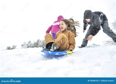 Girl Sledding Downhill Stock Photo Image Of Shoves Sledding 59608162