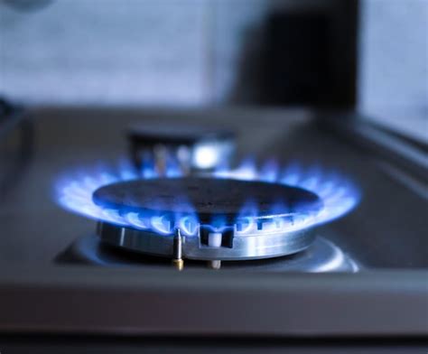 Premium Photo Closeup Of A Blue Fire From A Kitchen Stove Gas Burner With A Burning Flame