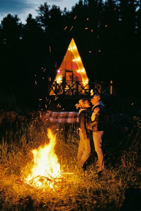 Couple standing near a Bonfire · Free Stock Photo