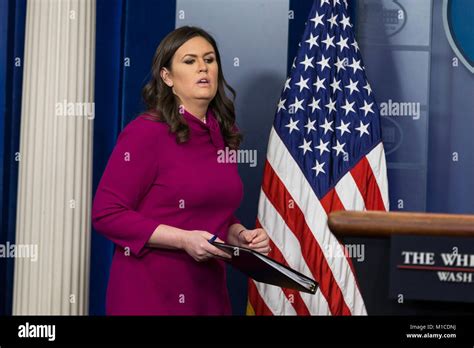 White House Press Secretary Sarah Huckabee Sanders takes the podium prior to speaking with ...