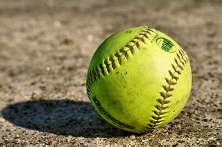 softball game  discarded softball caught  eye  flickr