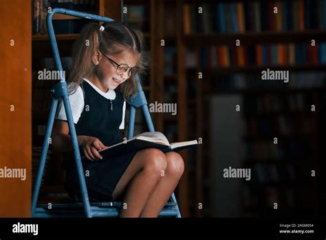 Girl On Library Ladder Hi Res Stock Photography And Images Alamy