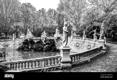 The Monumental Fountain Of Twelve Months Surrounded By Trees In