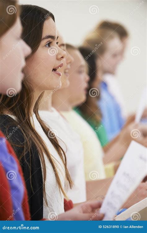 Group Of School Children Singing In Choir Together Stock Photo Image