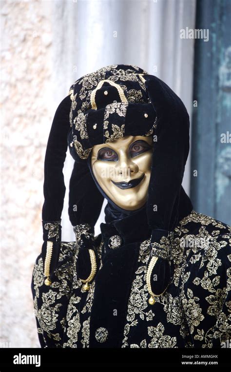 Person Dressed In A Mask And Costume At The Carnevale Venice Carnival