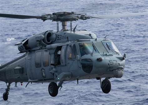 In Close Orbit Helicopter Sea Combat Squadron HSC 23 Aboard USS