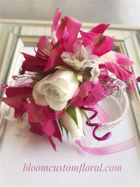 A Fun Prom Corsage With Hot Pink Alstroemeria And White Spray Roses On A