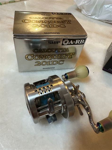 Shimano Calcutta Conquest 201DC Sports Equipment Fishing On Carousell