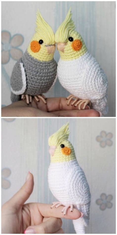 Two Small Crocheted Birds Sitting Next To Each Other On Top Of A Hand