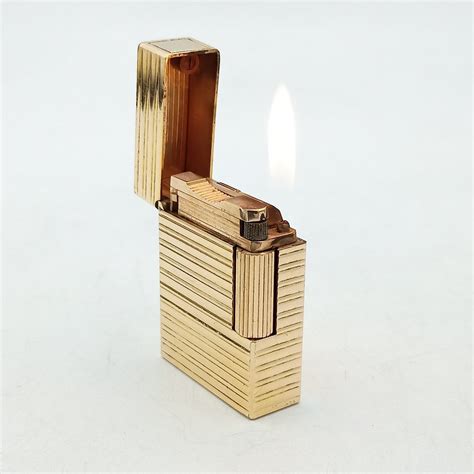 S T Dupont Linea 1 Tamaño pequeño Lighter gold plated Catawiki