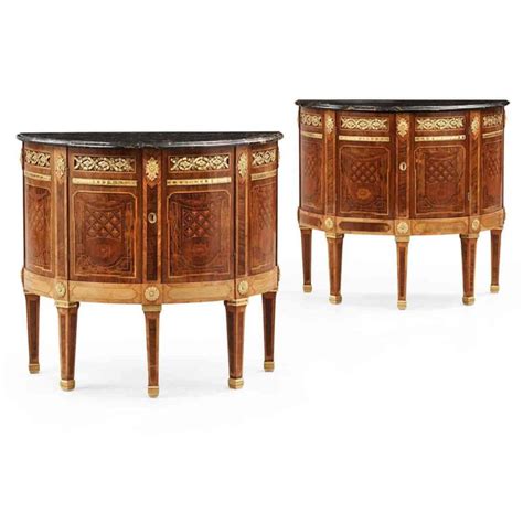 A Pair Of Sideboards In The Style Of Louis Ii With Marble Top France