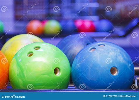 Bowling Balls of Different Colors on the Wall Close-up Stock Image ...