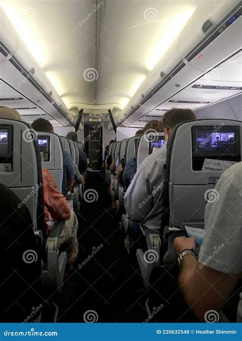 Passengers Waiting For Take Off On A United Airline Flight At Newark Airport In New Jersey Usa