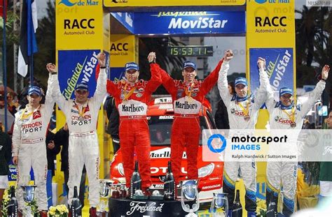 The Podium L To R Sebastien Loeb FRA With Co Driver Daniel Elena