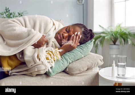 Sick Young African American Woman Is Not Feeling Well And Is Lying At