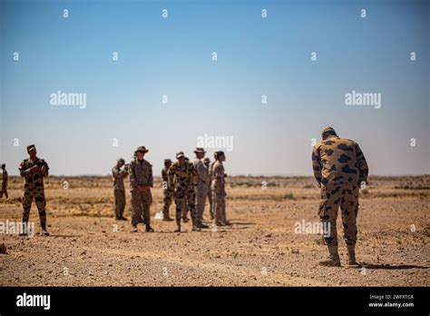 A Member Of The Egyptian Special Forces Uses A Mirror Technique To Search Personnel While