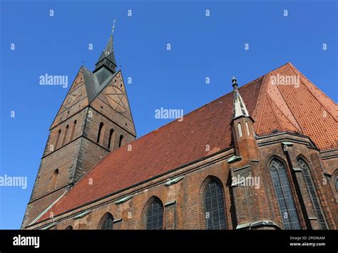 Historic Marktkirche Aka Market Church With Red Roof And Blue Sky In