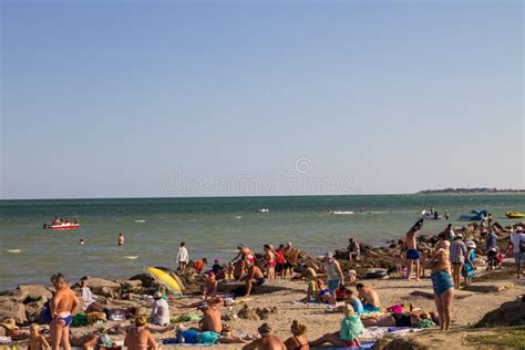 Unknown People Enjoy On The Beach Of Azov Sea Editorial Stock Image