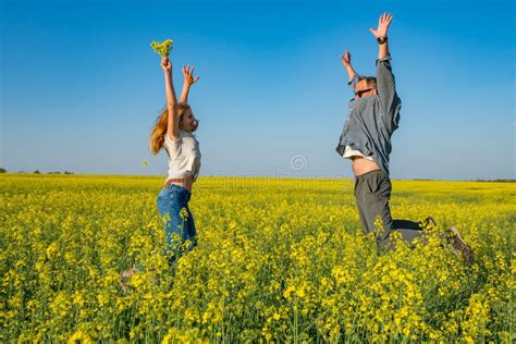 Happy Couple Open Arms Jumping Stock Photos Free And Royalty Free Stock