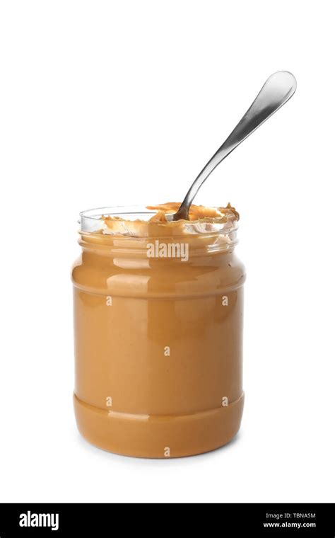 Jar with peanut butter on white background Stock Photo - Alamy